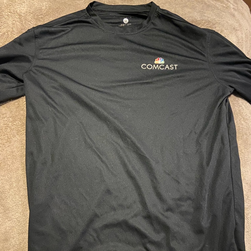 Black comcast shirt